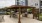 a patio with a table and chairs
