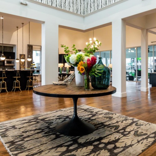 The essence of exceptional living a room with a table and chairs
