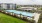 a pool with a building in the background