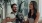 man and woman sit on a couch with their dog