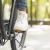 close up of someone riding a bicycle