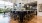 a kitchen with a bar and stools